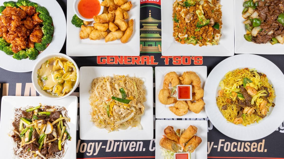 Chinese food catering spread from General Tso's — lo mein, fried rice, crab rangoons, spring rolls and entrées