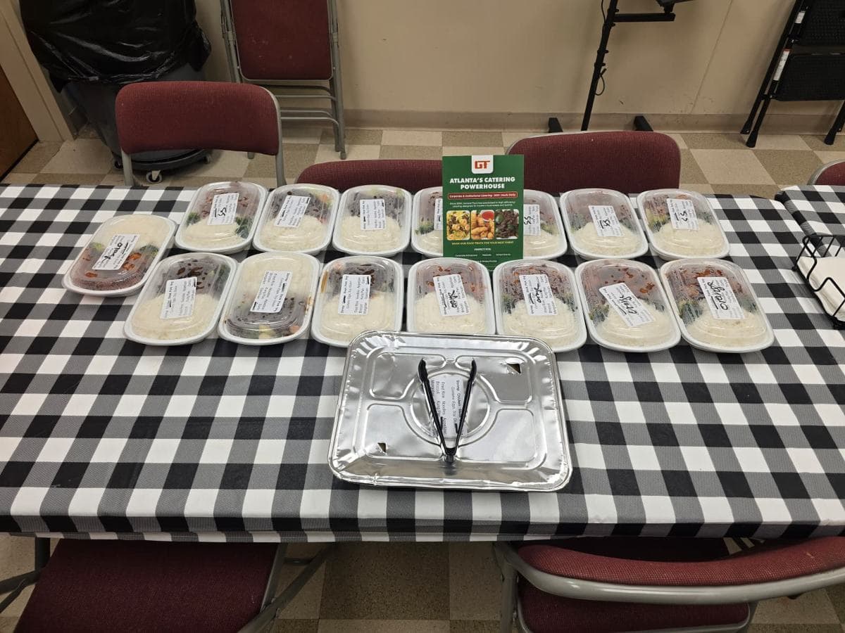 Individually packaged and labeled boxed meals for a corporate lunch