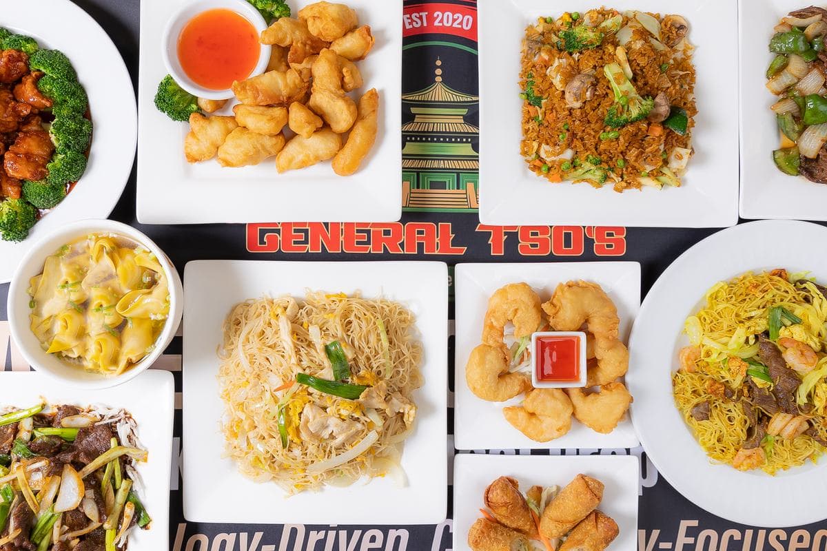 General Tso's party feast with orange chicken, noodles, fried rice and appetizers